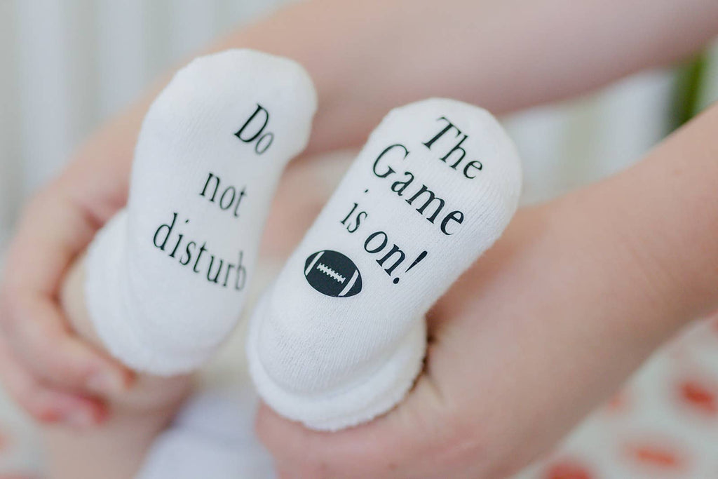 Do Not Disturb The Game is on Football Baby Socks | Sports: 0-6mo